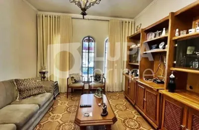 Casa térrea com 4 quartos, churrasqueira e 5 vagas para venda, tucuruvi