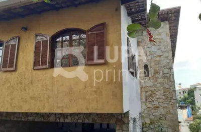 Sobrado com 412m² e 3 casas no terreno à venda - casa verde