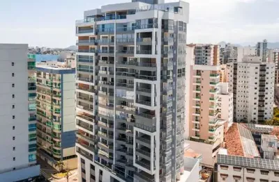 Apartamento 2 quartos (1 suíte) na praia do morro – vista para o mar e lazer completo na cobertura