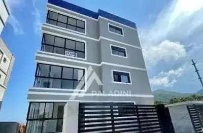 Venda apartamento no village em imbituba sc – 2 dormitórios, suíte, vista mar e montanhas.