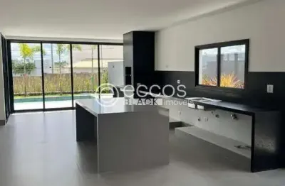 Casa em condomínio à venda, 4 quartos, 4 suítes, 2 vagas, gávea - uberlândia/mg