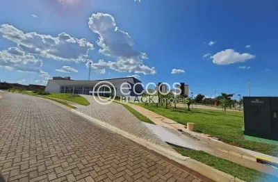 Terreno em condomínio fechado à venda na Avenida Vereador Carlito Cordeiro, Laranjeiras, Uberlândia