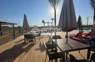 Terreno em condomínio fechado à venda na Avenida Segismundo Pereira, 4554, Novo Mundo, Uberlândia