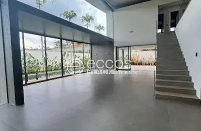 Casa em condomínio à venda, 4 quartos, 4 suítes, 2 vagas, gávea - uberlândia/mg