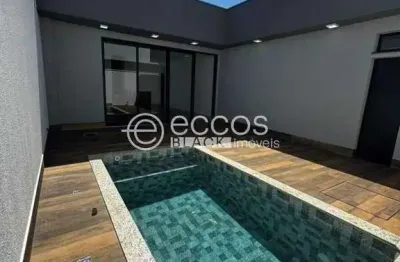 Casa em condomínio à venda, 3 quartos, 3 suítes, 2 vagas, novo mundo - uberlândia/mg