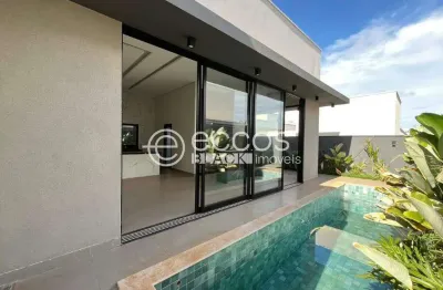 Casa em condomínio à venda, 3 quartos, 3 suítes, 4 vagas, laranjeiras - uberlândia/mg