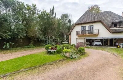 Casa com 4 dormitórios à venda, 680 m² por R$ 2.050.000,00 - Taboão - Curitiba/PR