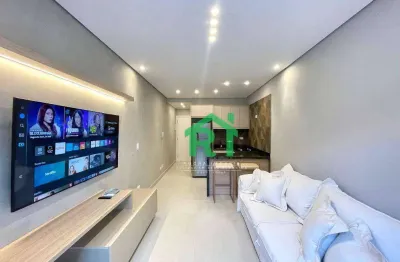 Apartamento à beira mar com 2 dormitórios, 1 vaga, área de lazer, tombo, guarujá/sp
