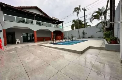 Casa de 4 quartos sendo três suítes, na Vila Assunção, Praia Grande, SP.