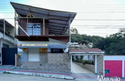 Terreno com 2 casas e 2 salas comerciais no bairro fazenda em itajaí