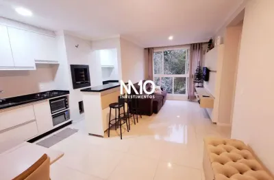 Apartamento de 2 dormitórios à venda no edifício gardem village em balneário cam