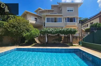 Casa com 4 dormitórios à venda, 409 m² por R$ 2.700.000,00 - Condomínio Estância Marambaia - Vinhedo/SP