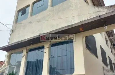 > prédio comercial próximo a avenida nossaa senhora das mercês .