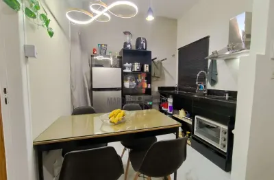 Oportunidade no centro: 2 quartos mobiliado, pronto para morar ou investir!