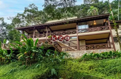 Casa de luxo em condomínio à venda em iporanga - guarujá-sp: 7 quartos, 7 suítes, 3 salas, 8 banheiros, 4 vagas, 338m².