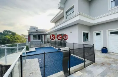 Casa de luxo no condomínio terras de santa teresa em vinhedo, com 4 suítes, 3 salas e 350m² de área privativa. venha conferir!