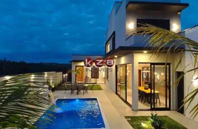Casa a venda em condomínio de alto padrão em vinhedo-sp: 3 suítes, 2 salas, gourmet com churrasqueira  e piscina.