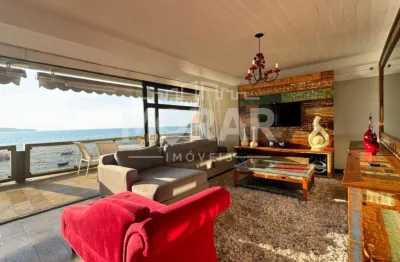 Das páginas de revista à sua disposição! apartamento com 4 suítes, beira-mar na praia do embrulho - bombinhas. valor r$6.000.000,00, agende agora mesmo a sua visita!