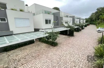 Casa em condomínio fechado com 3 quartos à venda na Rua Doutor Ney de Castilhos Ferreira, 350, Pedra Redonda, Porto Alegre