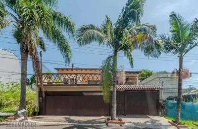 Excelente casa a venda no bairro ipanema, 3 dormitórios com suíte e 8 vagas de garagem!