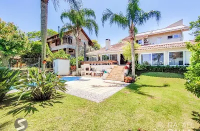 Casa em condomínio fechado com 3 quartos à venda na Avenida Firmino Octávio Bimbi, 333, Cavalhada, Porto Alegre