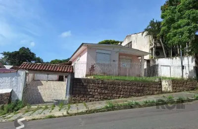 Terreno com casa com 3 quartos, vaga de garagem, no bairro ipanema, porto alegre/rs