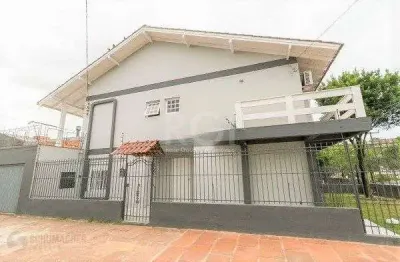 Casa para venda - 238.35m², 4 dormitórios, sendo 1 suites, 2 vagas - nonoai