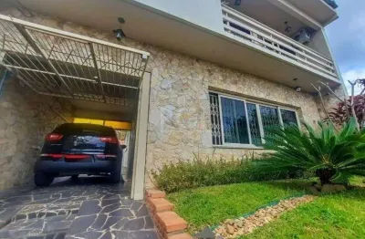 Excelente casa com 3 dormitórios e 3 vagas de garagem