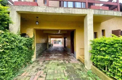 Casa com 3 quartos à venda na Rua Agulhas Negras, 118, Coronel Aparício Borges, Porto Alegre