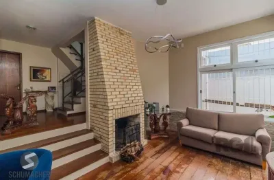 Casa com 3 quartos à venda na Rua Márcio Dias, 561, Nonoai, Porto Alegre