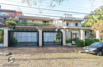 Casa para venda - 420m², 5 dormitórios, sendo 2 suites, 6 vagas - nonoai