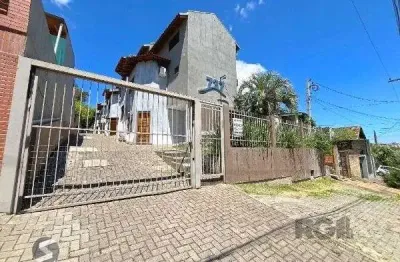 Casa em condomínio fechado com 3 quartos à venda na Rua Costa Lima, 810, Nonoai, Porto Alegre