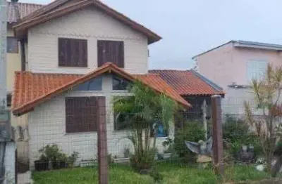 Casa com 3 quartos à venda na Rua dos Guenoas, 165, Guarujá, Porto Alegre