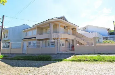 Casa térrea de 2 dormitórios e 3 vagas de garagem na vila ipiranga em porto alegre.
