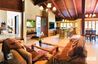 Casa em condomínio fechado com 7 quartos à venda na Avenida da Cavalhada, 5258, Cavalhada, Porto Alegre