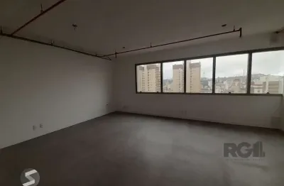 Excelente sala comercial no menino deus, com uma vaga de garagem.