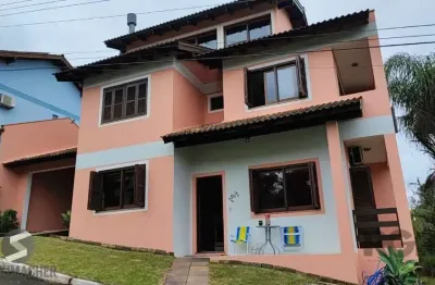Casa em condomínio fechado com 4 quartos à venda na Avenida Vicente Monteggia, 2088, Cavalhada, Porto Alegre