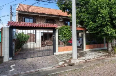 Casa com 5 quartos à venda na Rua Vinte e Um de Agosto, 217, Cavalhada, Porto Alegre