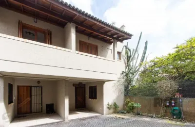 Casa em condomínio fechado com 2 quartos à venda na Avenida Guarujá, 176, Guarujá, Porto Alegre