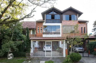 Casa com 3 quartos à venda na Rua Ponciano Pacheco da Silveira, 174, Guarujá, Porto Alegre
