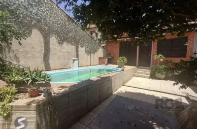 Casa com 4 quartos à venda na Rua Laguna, 264, Cavalhada, Porto Alegre