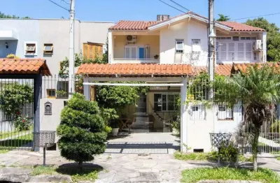Casa com 3 quartos à venda na Rua Helio Felix Frey, 205, Espírito Santo, Porto Alegre