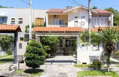 Casa com 3 quartos à venda na Rua Helio Felix Frey, 205, Espírito Santo, Porto Alegre