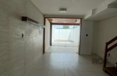 Casa com 3 quartos à venda na Rua Heitor Kramer, 161, Guarujá, Porto Alegre