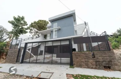 Casa com 3 quartos à venda na Rua Professor Emílio Meyer, 277, Vila Conceição, Porto Alegre