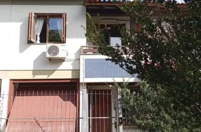Casa em condomínio fechado com 3 quartos à venda na Rua Itapitocaí, 1129, Cristal, Porto Alegre