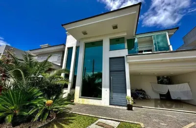 Casa em condominio com tres dormitórios tres suites