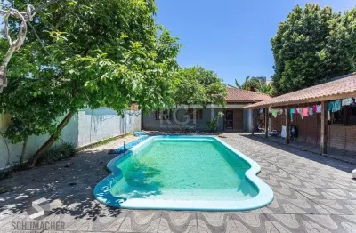 Casa com 5 quartos à venda na Rua Cassino, 118, Ipanema, Porto Alegre