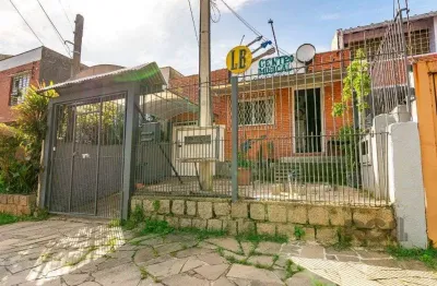 Casa com 3 quartos à venda na Avenida José Gertum, 582, Chácara das Pedras, Porto Alegre