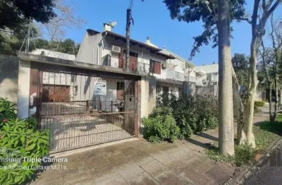 Casa com 4 quartos à venda na Avenida Fábio Araújo Santos, 1302, Nonoai, Porto Alegre